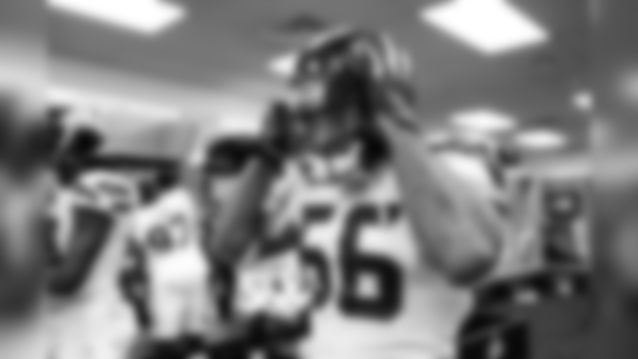 Newly acquired linebacker Mychal Kendricks adjusts his helmet before leaving the visitor's locker room at Soldier Field for the game against the Bears.