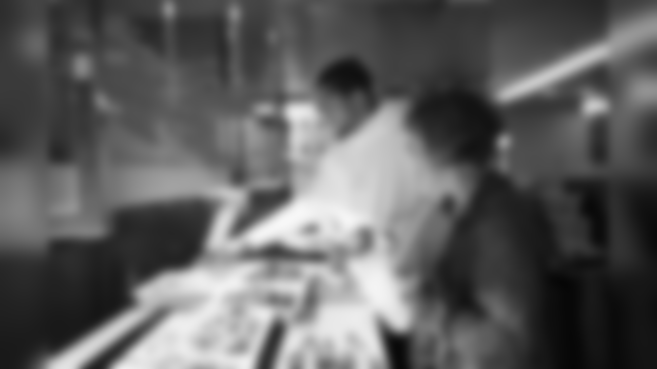 Linebacker Bobby Wagner fills his plate in the team's meal room.