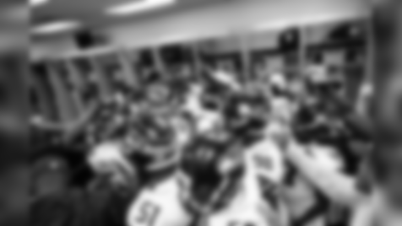 Seahawks defensive players gather before leaving the locker room for pregame warmups.
