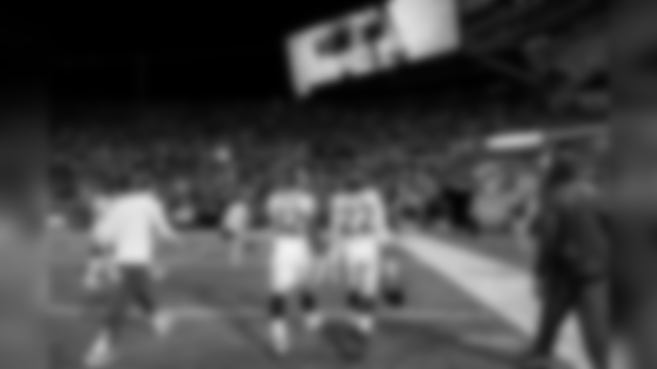 Seahawks running backs Chris Carson and C.J. Prosise head to the locker room following the game.