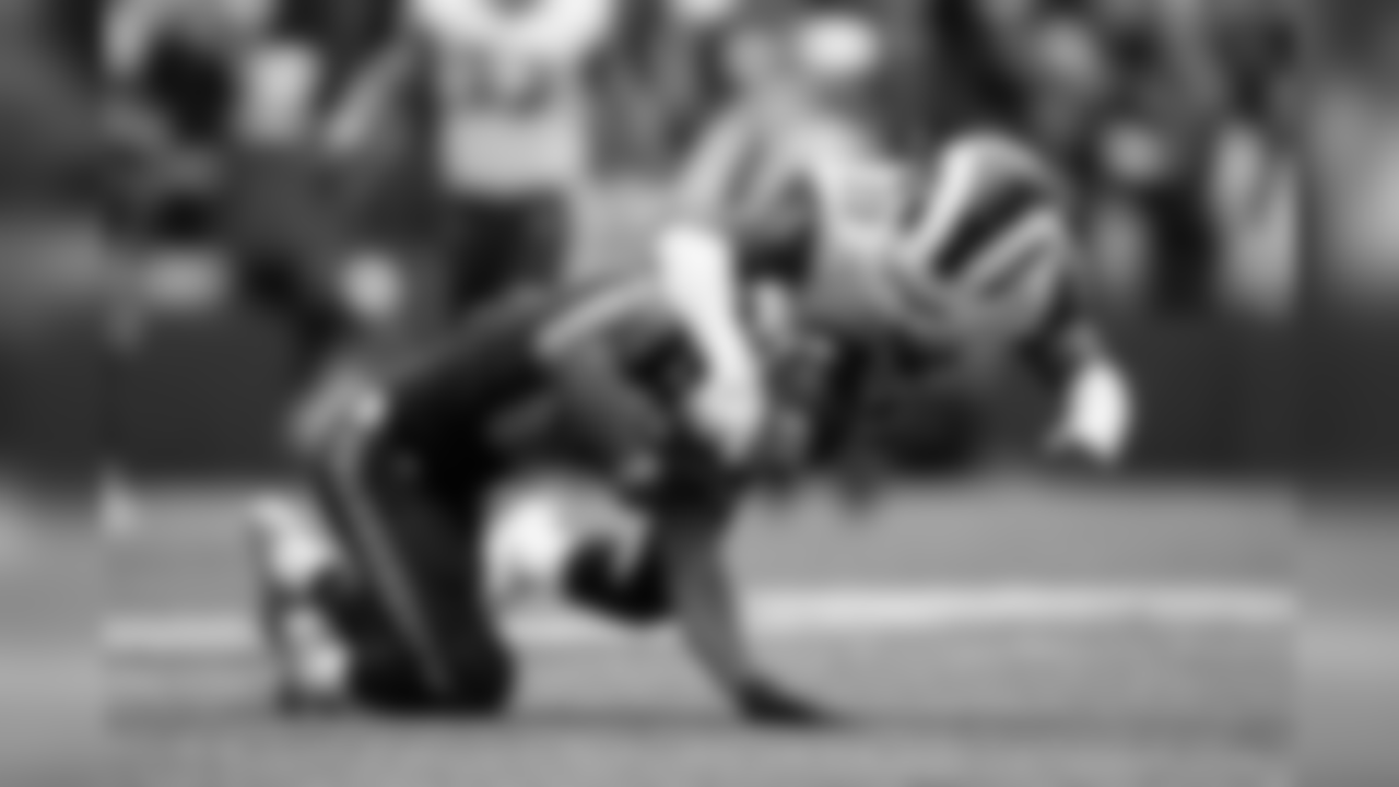 Seattle's Tyler Lockett gets grabbed by the face mask after coming down with a 44-yard reception as the Seahawks tried to get into scoring position late in the game.