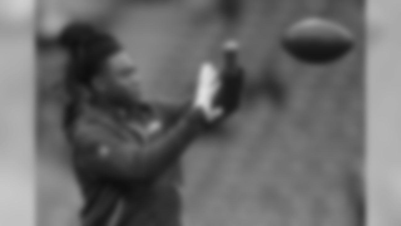Seattle Seahawks linebacker Shaquem Griffin (49) catches the ball during the warm-up before an NFL football game against Oakland Raiders at Wembley stadium in London, Sunday, Oct. 14, 2018. (AP Photo/Matt Dunham)
