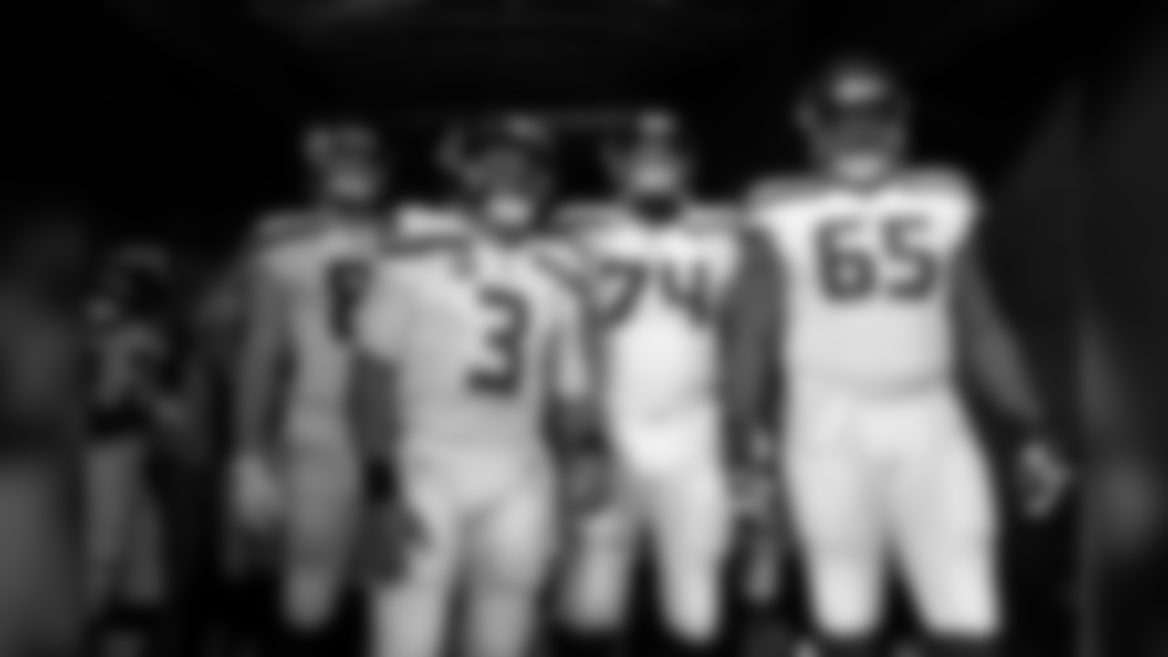 Seahawks Nick Vannett, Russell Wilson George Fant and Germain Ifedi wait for the Seahawks to introduced prior to kickoff.