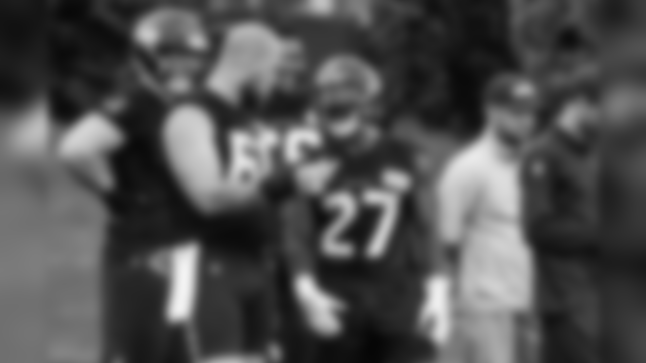 C Justin Britt, left, and RB Mike Davis, right