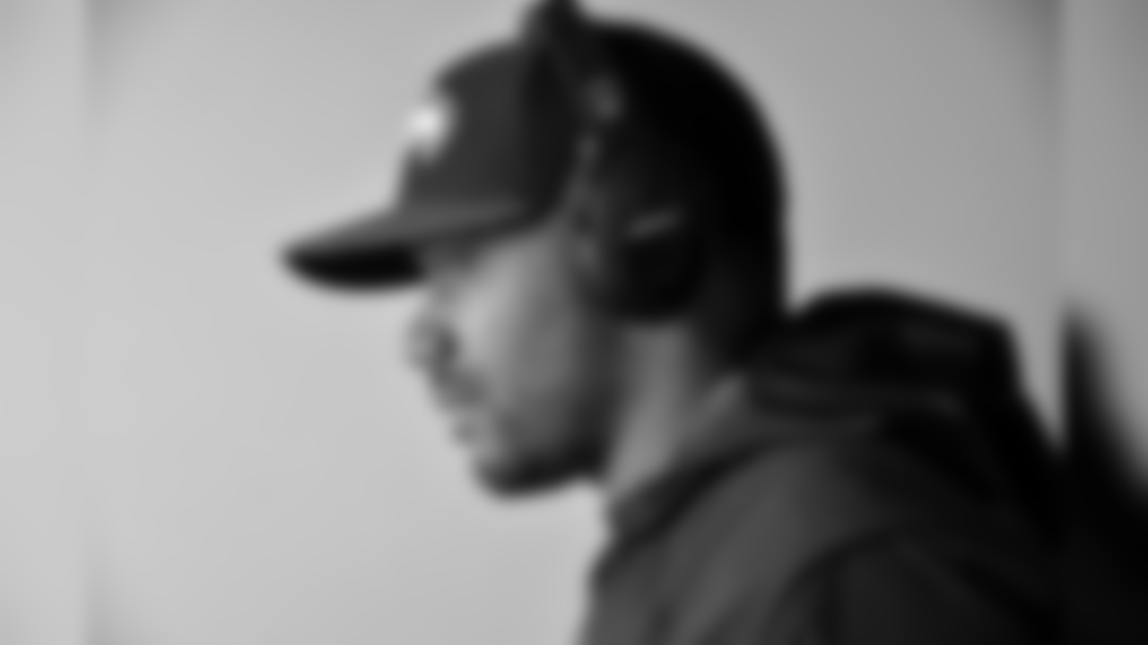 At the stadium, quarterback Russell Wilson made his way to from the locker room to the field for his early warmups wearing his custom Bose headphones.