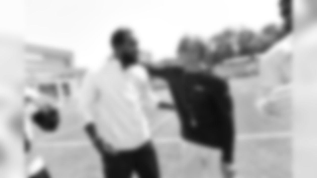SS Kam Chancellor, left, and head coach Pete Carroll, right
