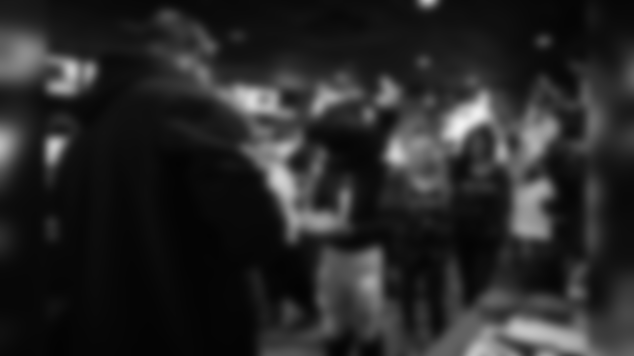 A Jan. 3, 2019 image of Texans TACT members attending a playoff party at Bowlmor.