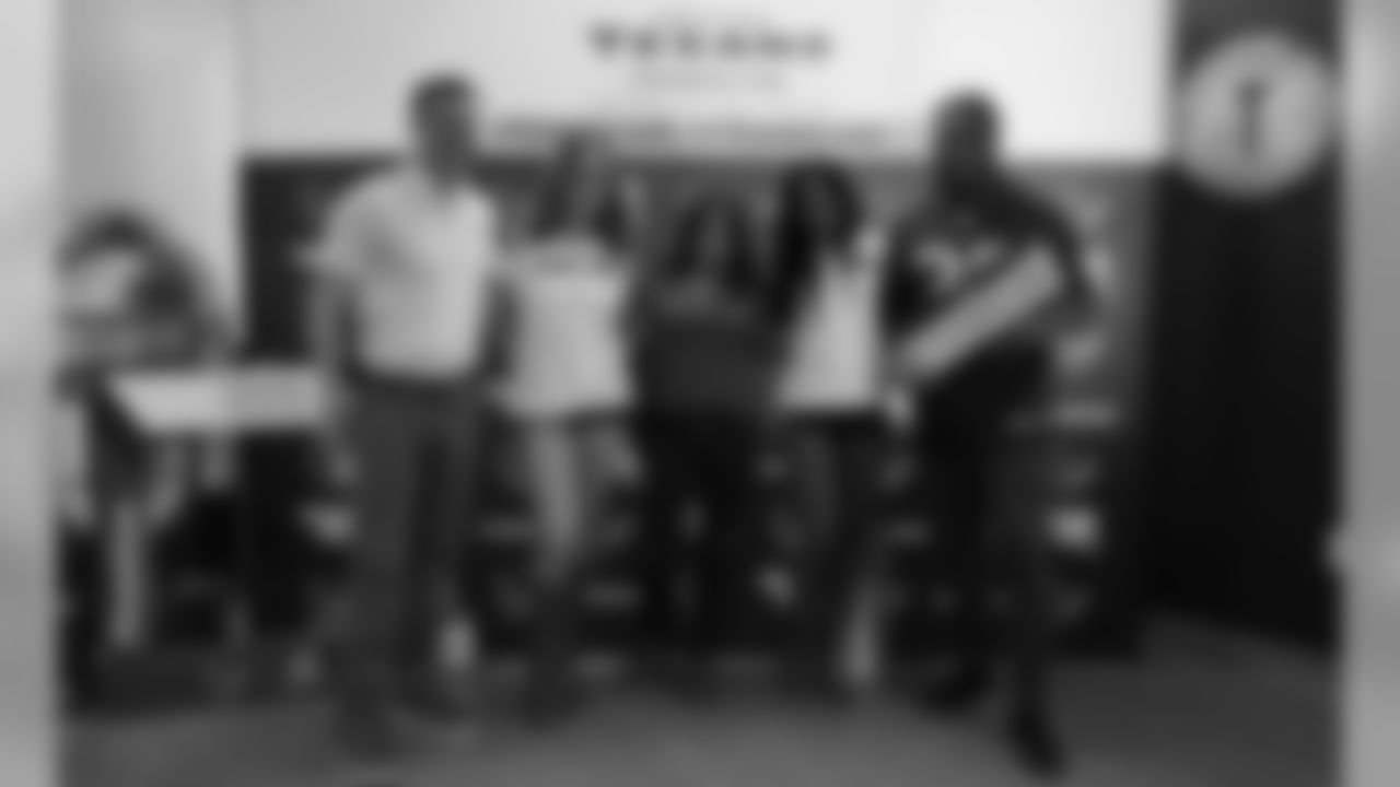 An image from the May 16, 2019 Texans Teen Club Graduation community development event.
