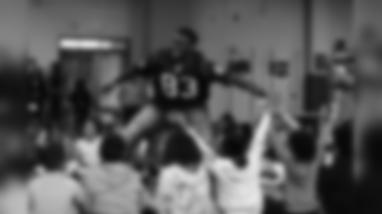 An image from the March 8, 2019 event at Alexander Elementary in which TORO, players and cheerleaders led students in math drills and hosted a Papa John's pizza party.