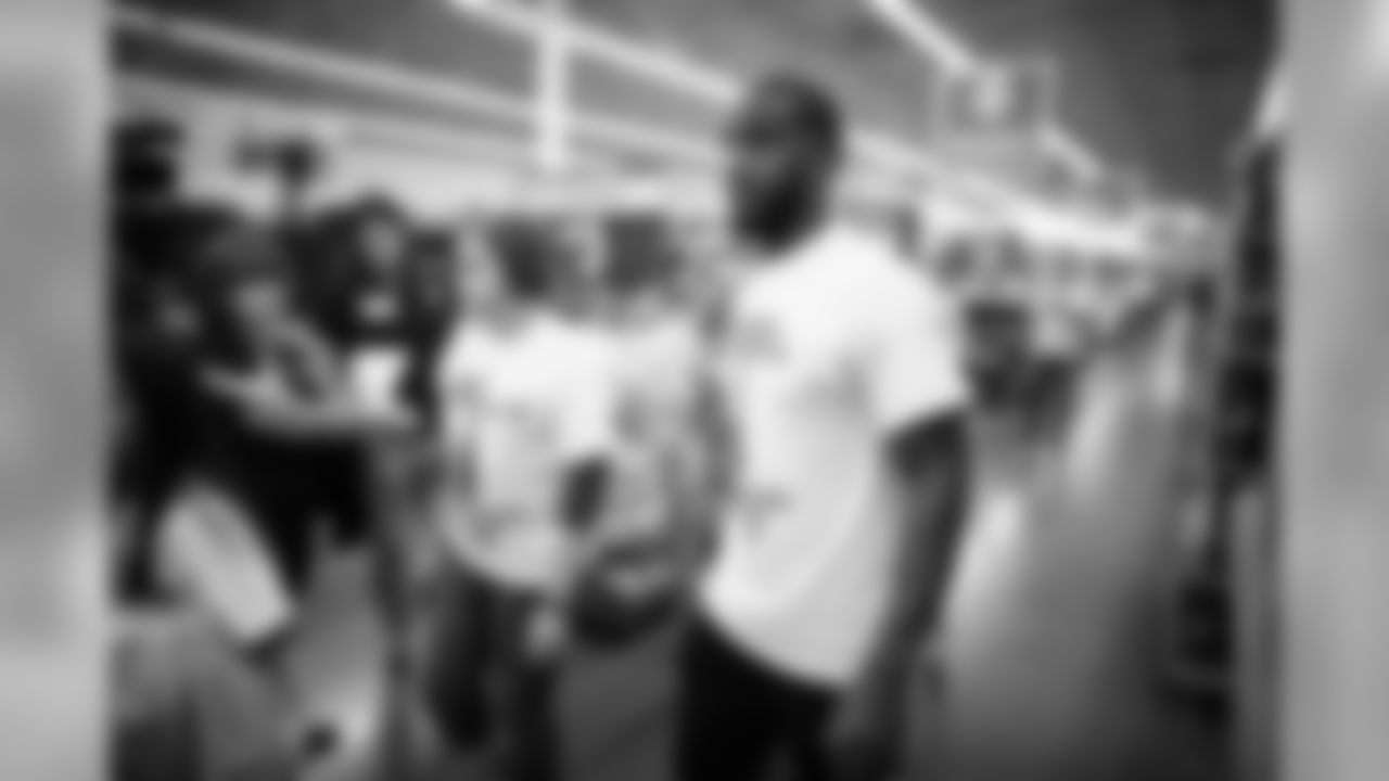 An image of the Dec. 4, 2018 community development event in which Kareem Jackson and his teammates purchased Christmas gifts for Houston-area students.