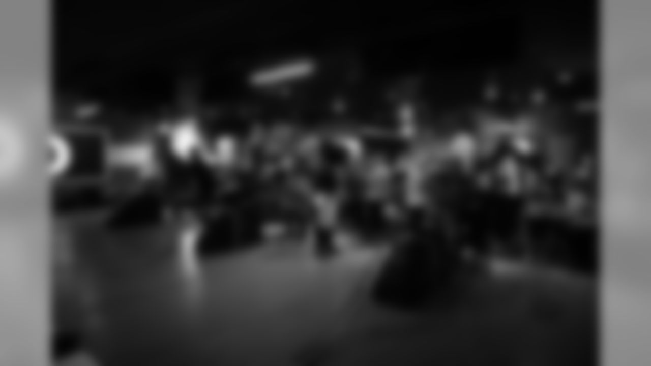 A Jan. 3, 2019 image of Texans TACT members attending a playoff party at Bowlmor.
