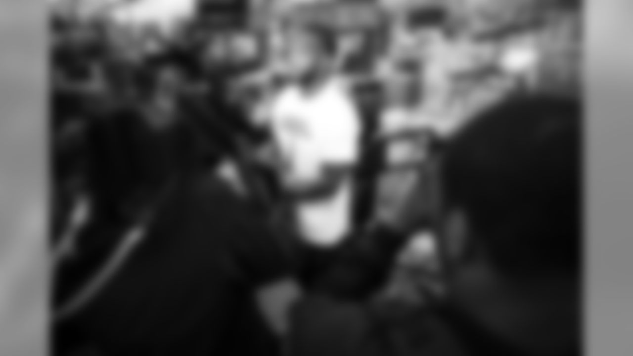 An image of the Dec. 4, 2018 community development event in which Kareem Jackson and his teammates purchased Christmas gifts for Houston-area students.