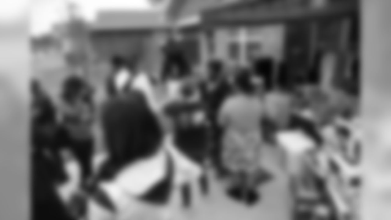 An image from the Oct. 24, 2018 corporate development event. Palais Royal donated home goods to a family in need.