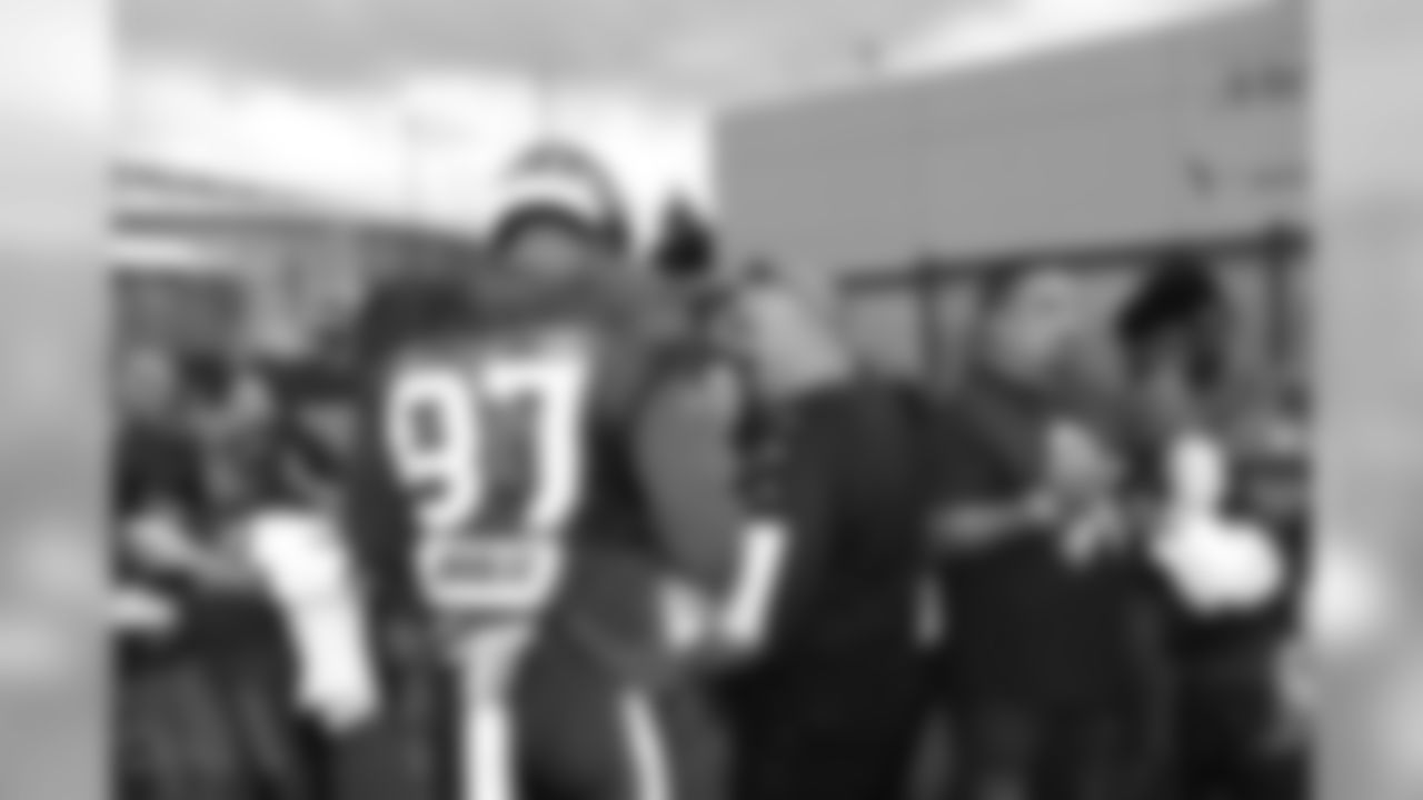 A Nov. 23, 2018 image of a community development event in which military families visited a Texans practice.