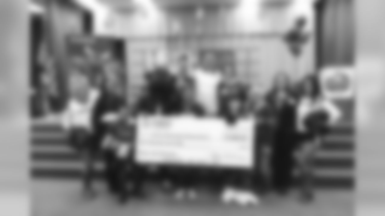 An image from the Nov. 13, 2018 corporate development event at Hirsch Elementary School in Spring, TX. Brian Peters, TORO, and cheerleaders visited the students and presented awards and a big check to teachers.