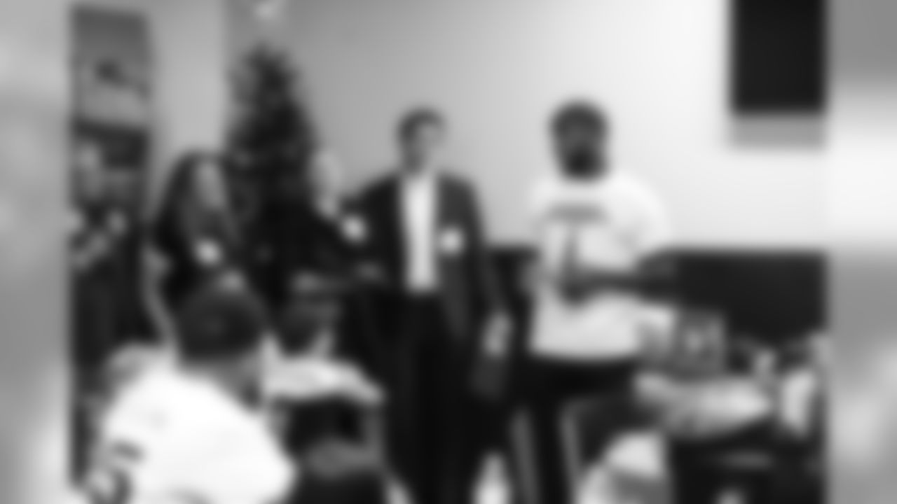 An image of the Dec. 4, 2018 community development event in which Kareem Jackson and his teammates purchased Christmas gifts for Houston-area students.