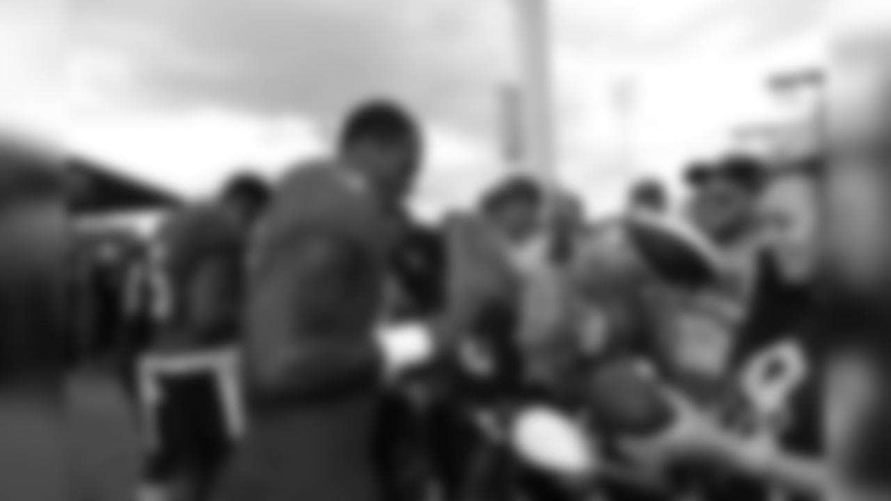 A Nov. 23, 2018 image of a community development event in which military families visited a Texans practice.