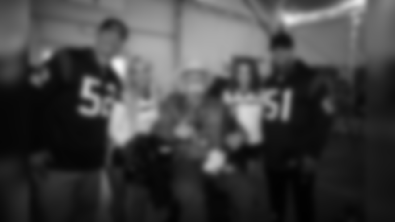 An image from the Feb. 27, 2019 community development event in which cheerleaders, Dylan Cole and Brian Peters attended the Houston Rodeo Military Appreciation BBQ.