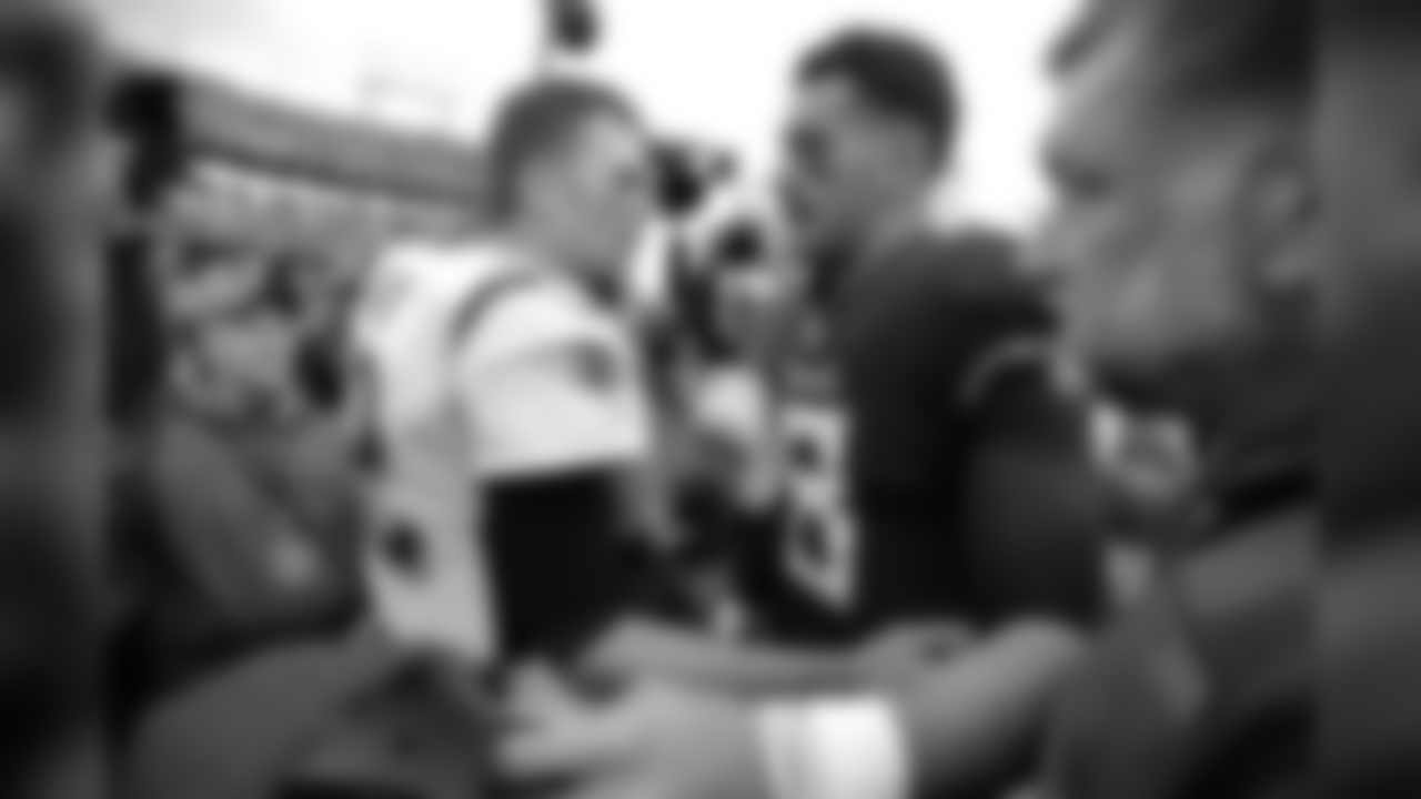 New England Patriots quarterback Tom Brady (12) congratulates Tennessee Titans quarterback Marcus Mariota (8) after an NFL football game Sunday, Nov. 11, 2018, in Nashville, Tenn. The Titans won 34-10. (AP Photo/Mark Zaleski)