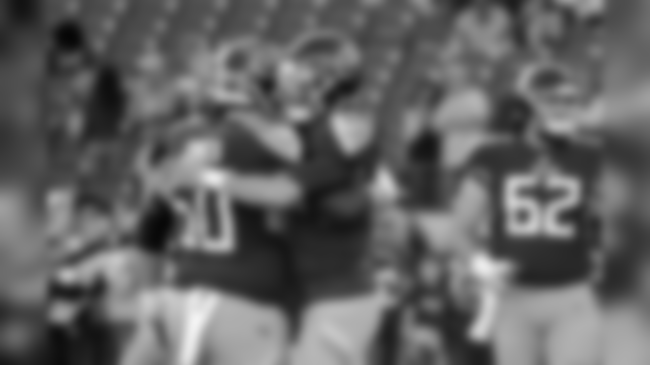 Tennessee Titans quarterback Marcus Mariota (8) hugs center Ben Jones (60) before an NFL football game against the New York Jets Sunday, Dec. 2, 2018, in Nashville, Tenn. (AP Photo/James Kenney)
