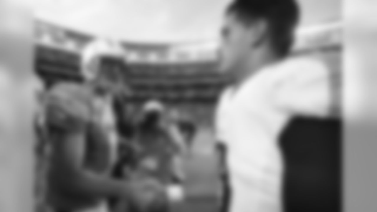 San Diego Chargers quarterback Philip Rivers, left, and Tennessee Titans quarterback Marcus Mariota, right, shake hands after an NFL football game Sunday, Nov. 6, 2016, in San Diego. The Chargers won. (AP Photo/Denis Poroy)