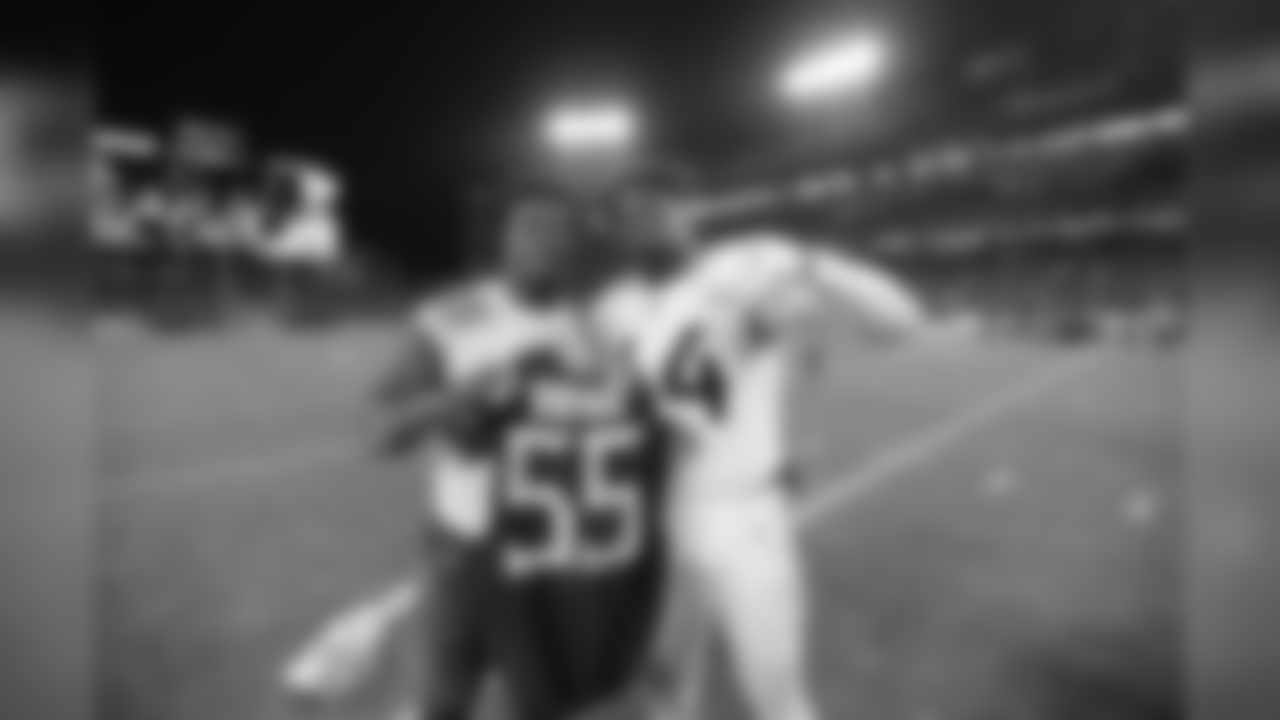 Tennessee Titans inside linebacker Jayon Brown, left, poses for a photo with Jacksonville Jaguars middle linebacker Myles Jack (44) during the second half of an NFL football game, Thursday, Dec. 6, 2018, in Nashville, Tenn. The Tennessee Titans won 30-9. (AP Photo/Mark Zaleski)