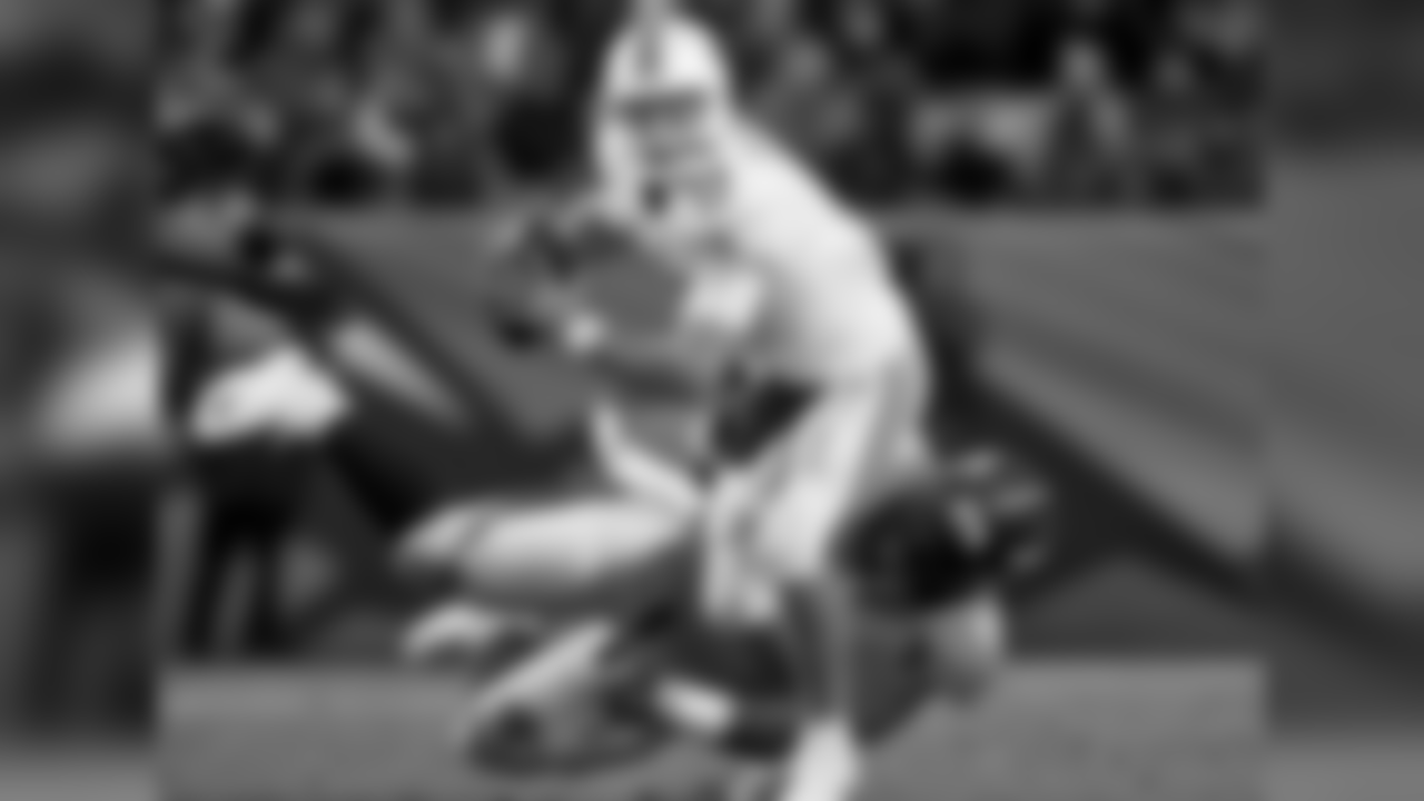 Miami Dolphins quarterback Ryan Tannehill (17) is sacked by Denver Broncos defensive tackle Terrance Knighton during the second half of an NFL football game, Sunday, Nov. 23, 2014, in Denver. (AP Photo/Joe Mahoney)