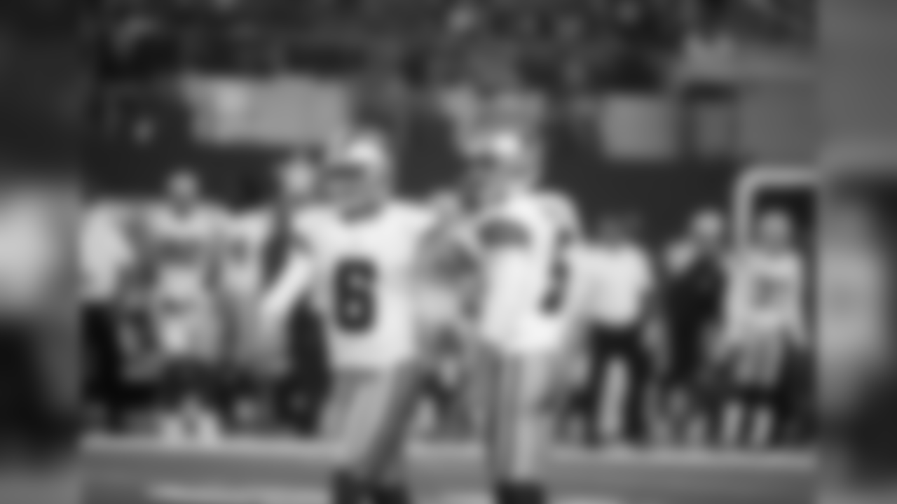 Dallas Cowboys punter Chris Jones (6) and kicker Dan Bailey (5) congratulate each other after an extra point during an NFL preseason football game against the Miami Dolphins on Friday, Aug. 19, 2016, in Arlington, Texas. (AP Photo/Michael Ainsworth)
