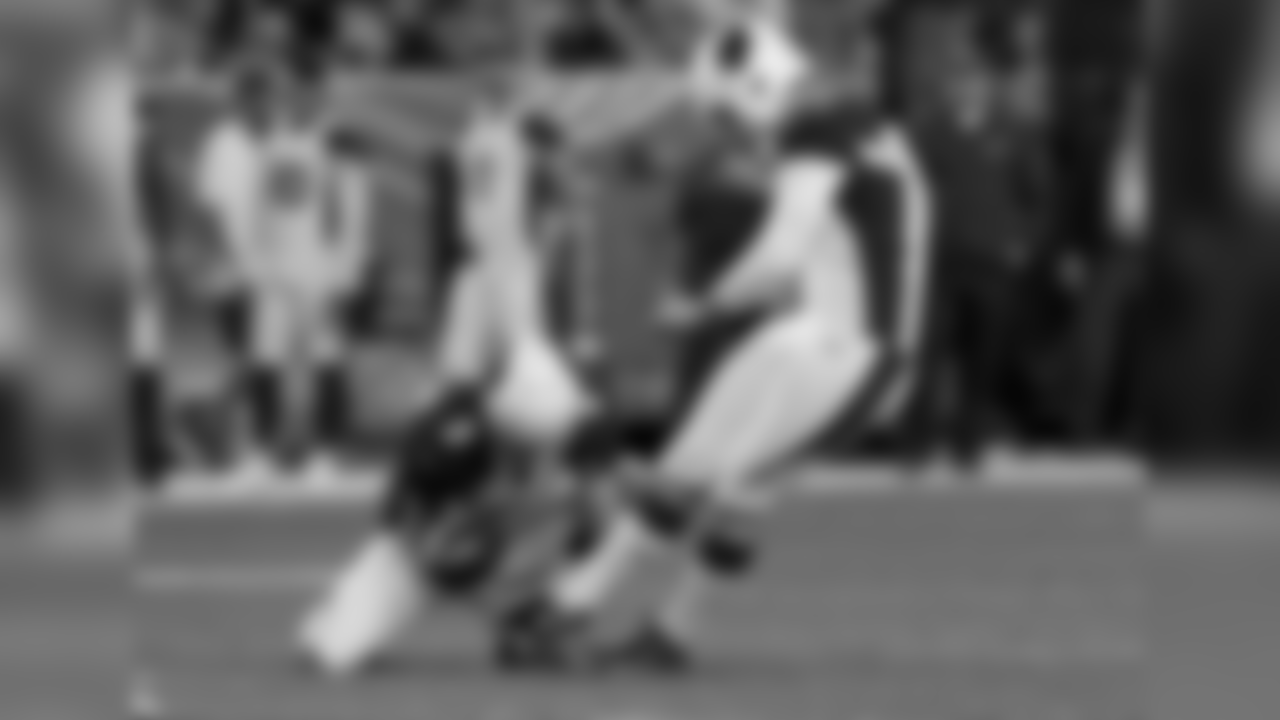Arizona Cardinals kicker Matt Wile (6) misses a field goal attempt as punter Richie Leone (9) holds during the first half of an NFL preseason football game against the Denver Broncos, Thursday, Aug. 31, 2017, in Denver. (AP Photo/Jack Dempsey)