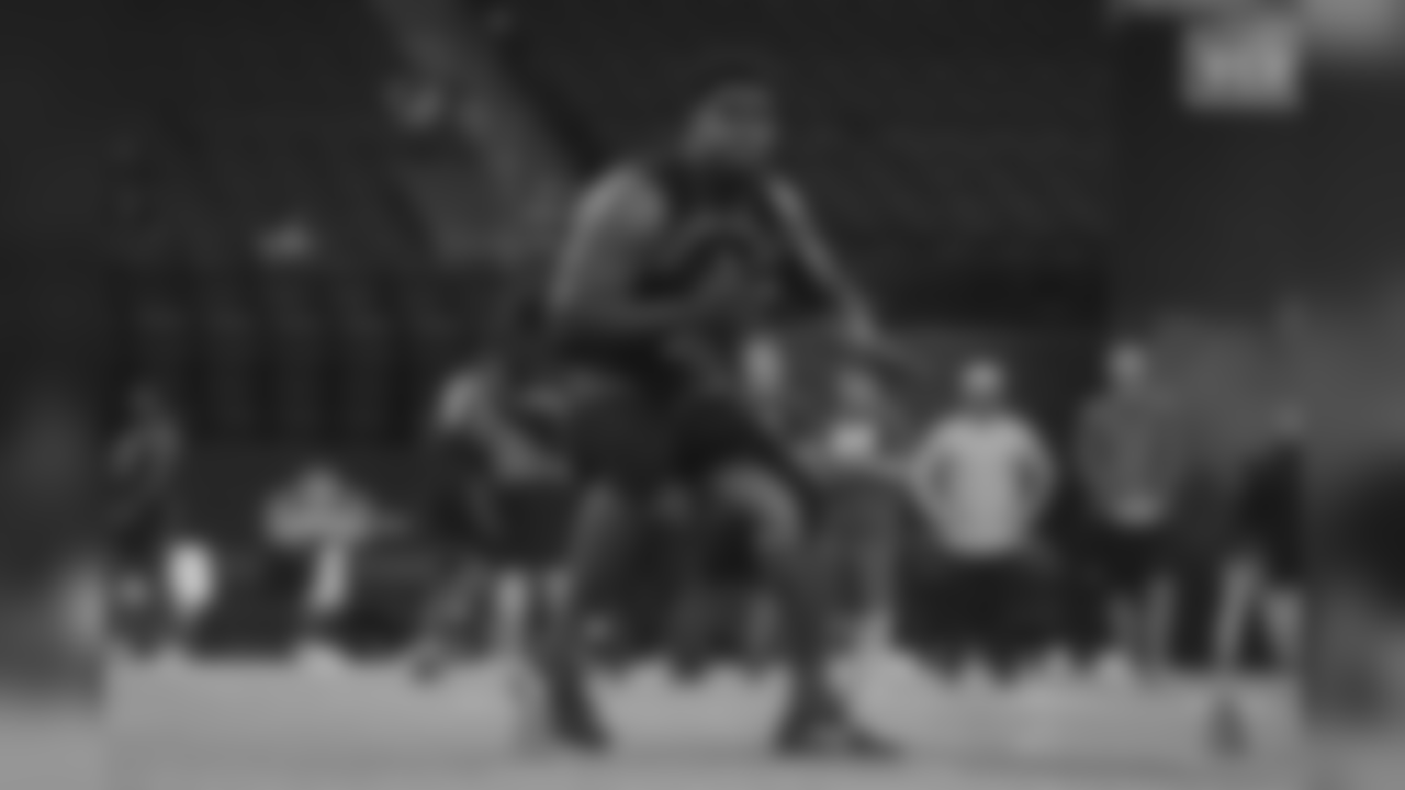 South Carolina offensive lineman Dennis Daley runs a drill.