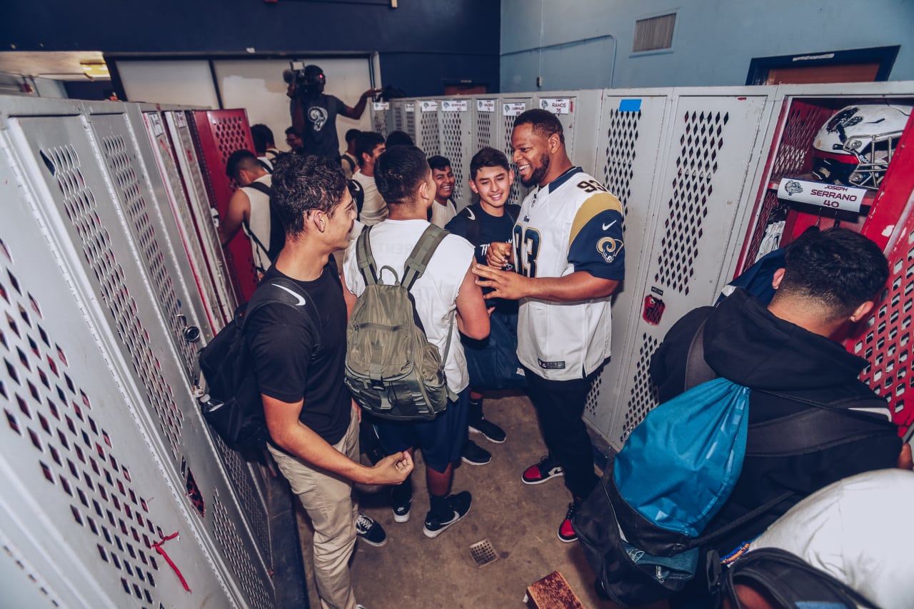 Defensive tackle (93) Ndamukong Suh and the Los Angeles Rams partner with Nike to provide youth football athletes from Garfield High School with new uniforms and gear for their upcoming competition at the East LA Classic. Wednesday, October 23, 2018 in Los Angeles, CA. (Will Navarro/Rams)