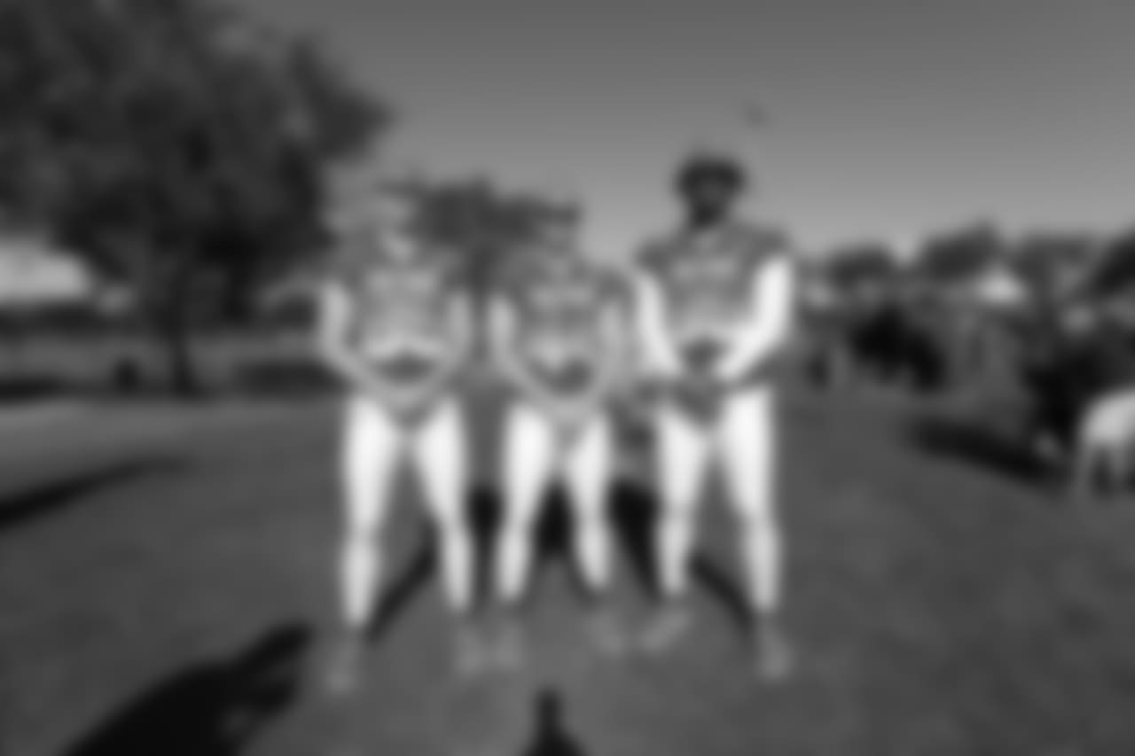 TE George Kittle, FB Kyle Juszczyk and DL DeForest Buckner