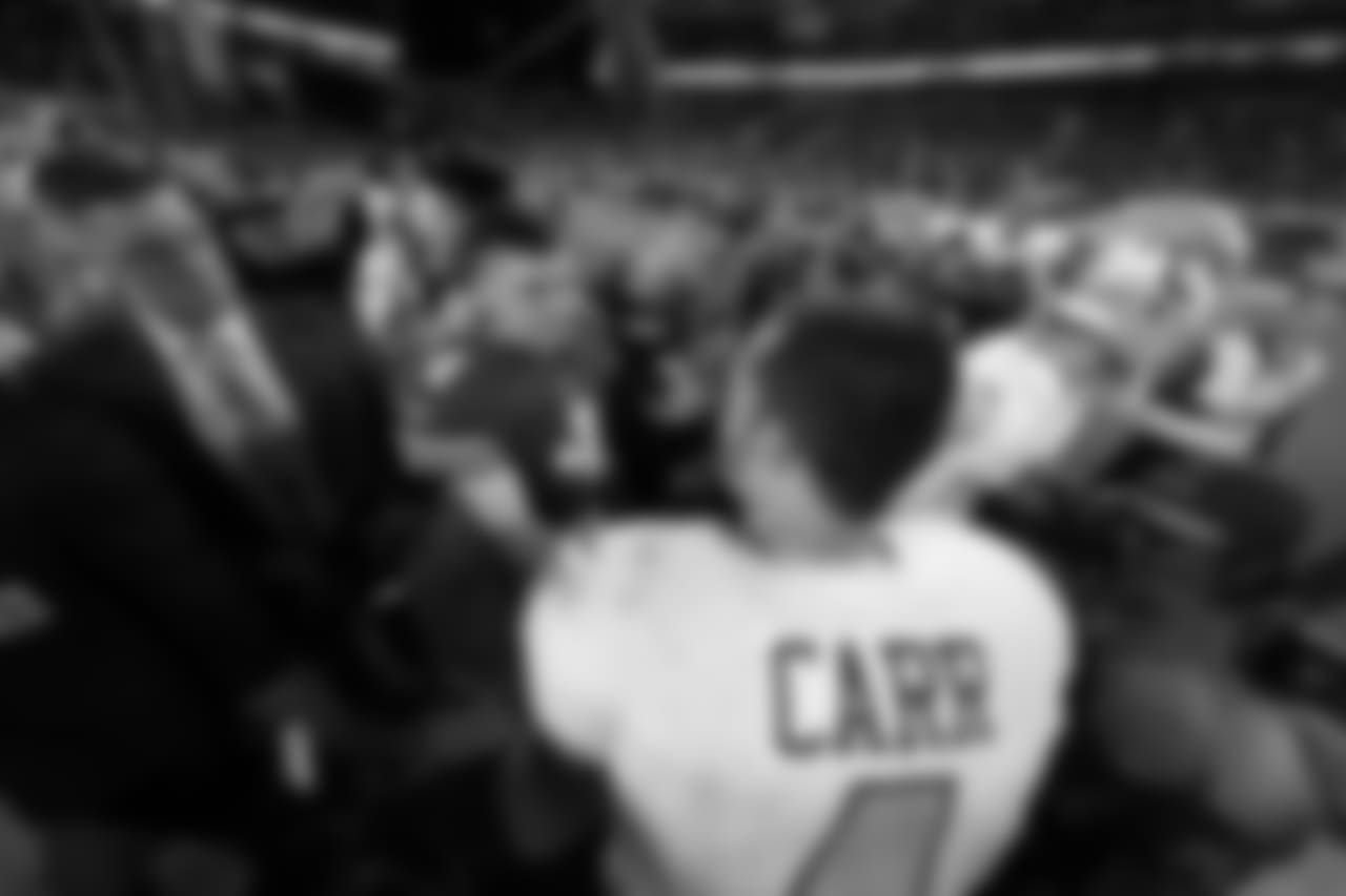 QB Nick Mullens and Raiders QB Derek Carr