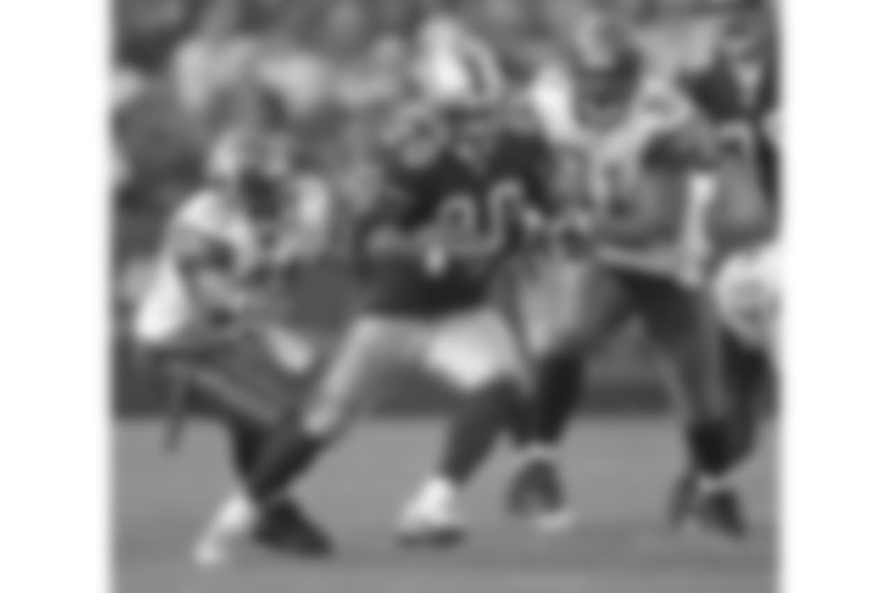 2002 -- 49ers running back Garrison Hearst.