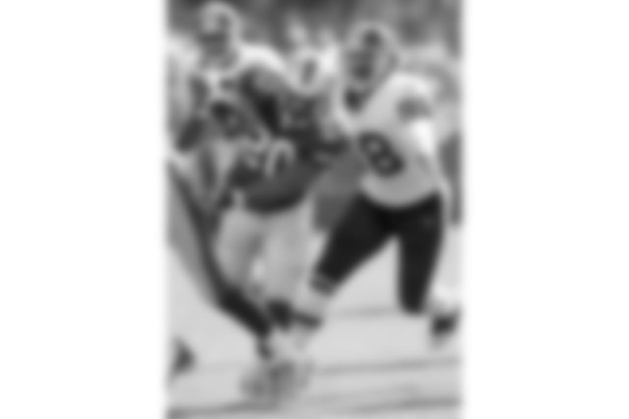 2002 -- 49ers running back Garrison Hearst.