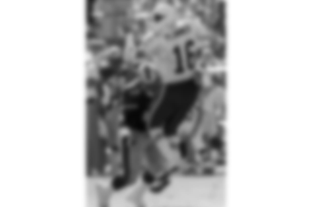 2000 -- 49ers pass-rusher Bryant Young and Cardinals quarterback Jake Plummer.