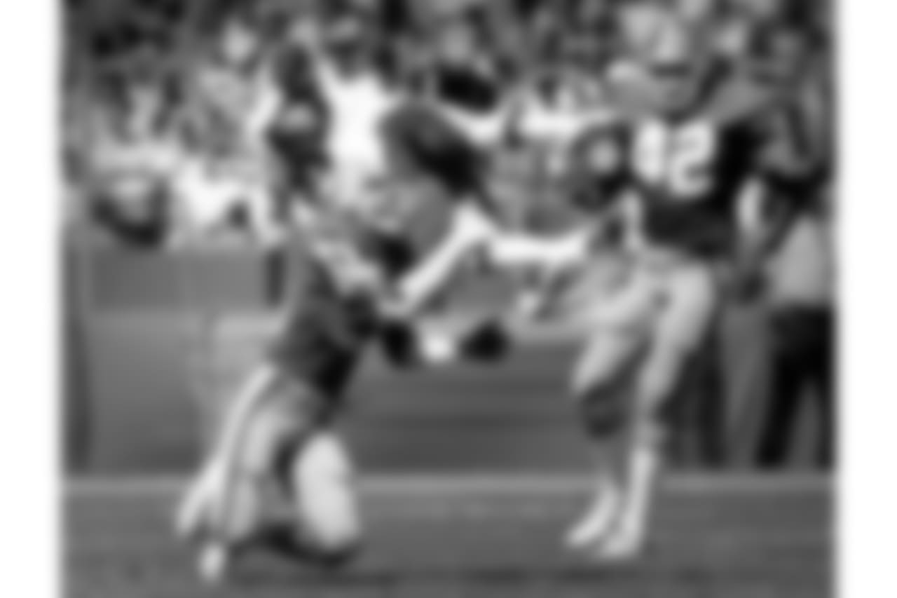 1990 -- Redskins wideout Ricky Sanders and 49ers defensive back Don Griffin.
