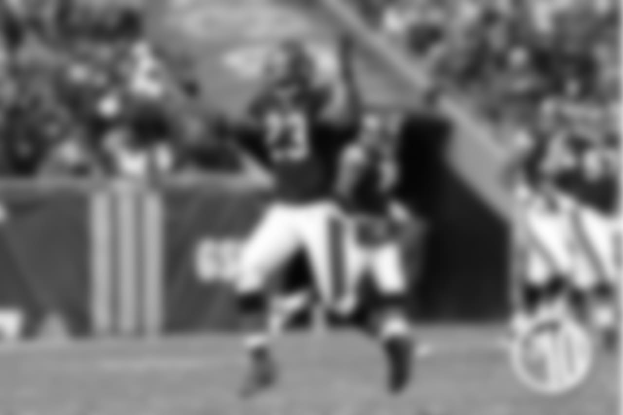 After fielding a bouncing ball, Hester slices through Vikings tackers on a 45-yard punt return touchdown in a 23-13 win over Minnesota on Dec. 3, 2006.