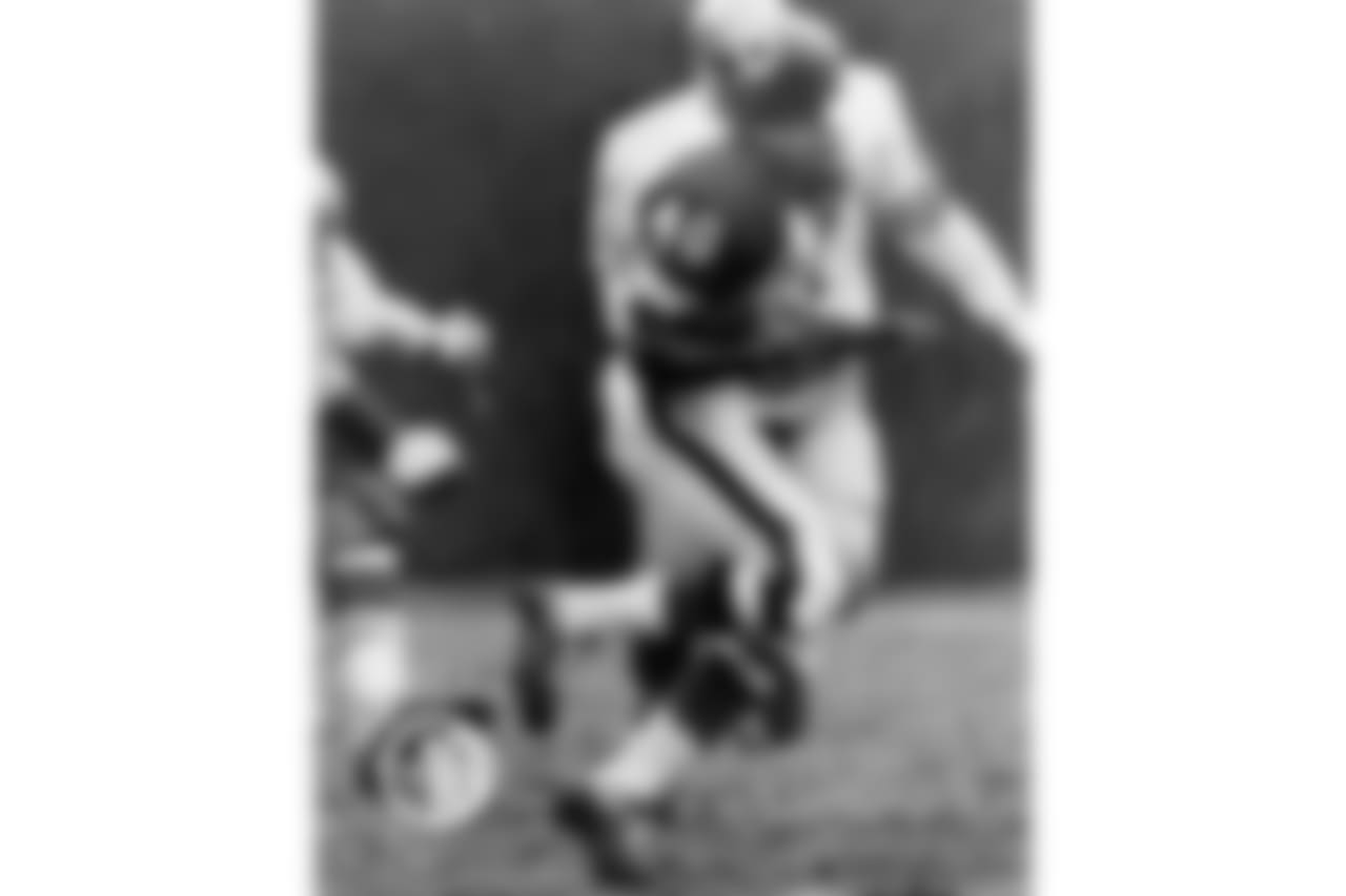 On a muddy Wrigley Field turf, Sayers set an NFL record with six touchdowns while compiling 336 all-purpose yards.