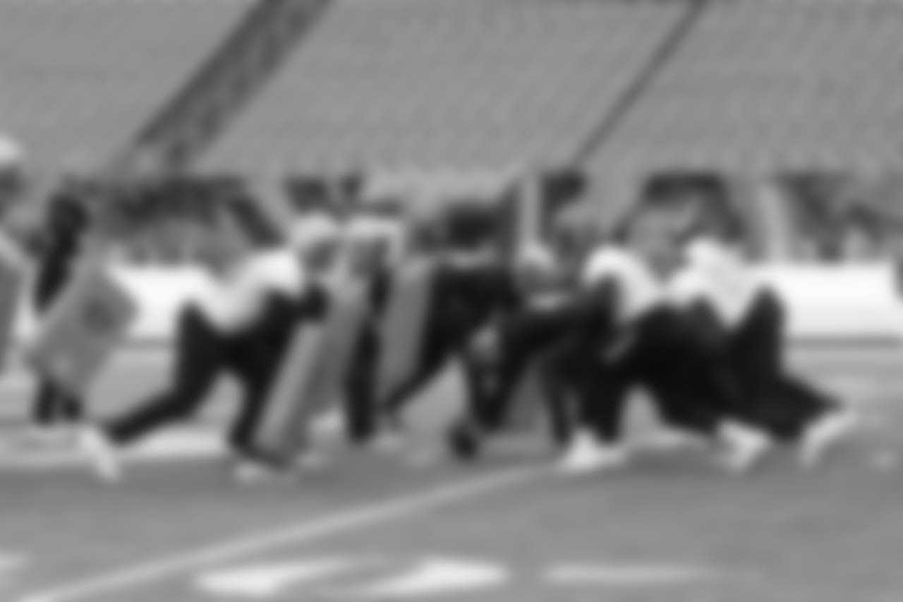 The Bengals special teams unit lines up during practice.