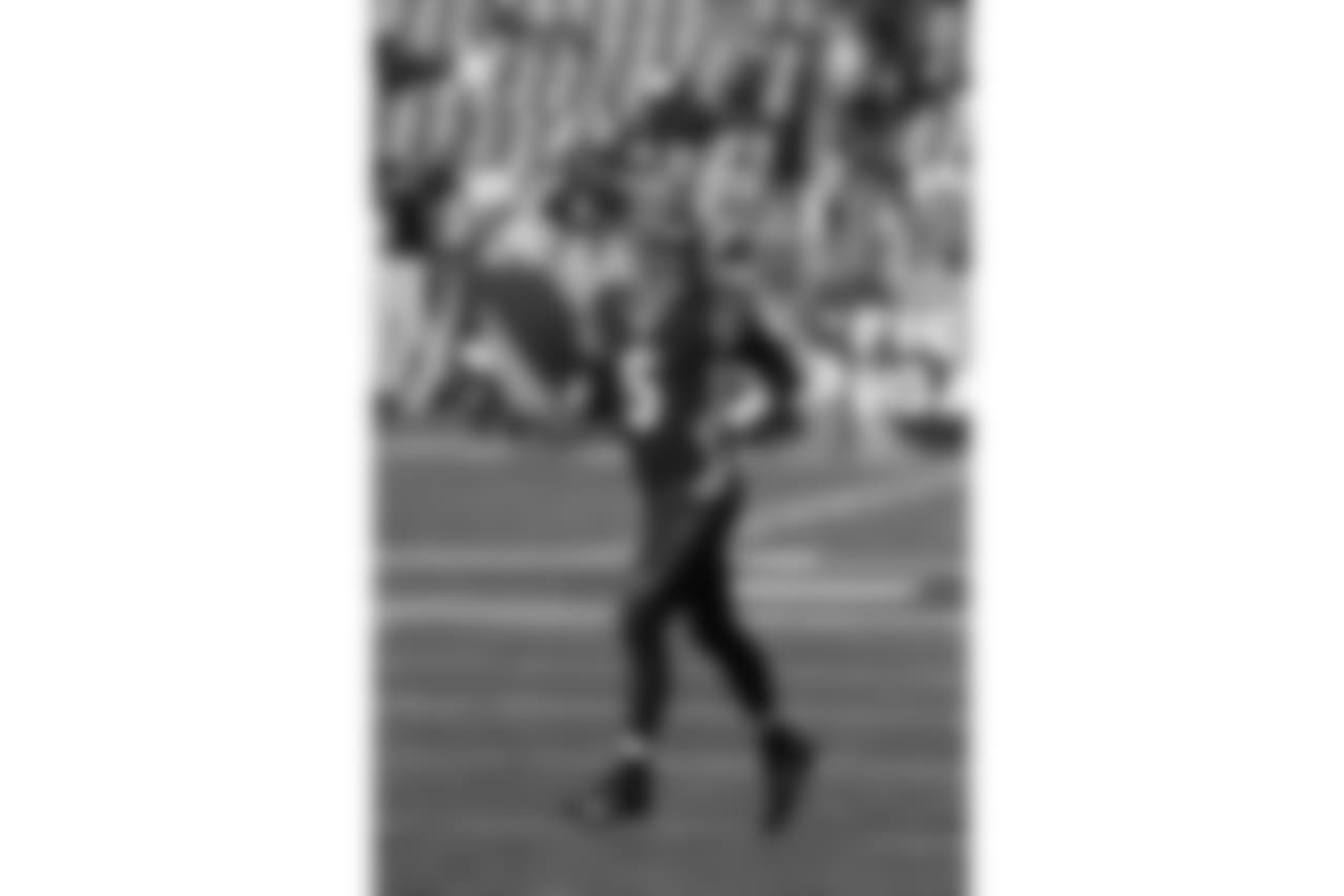 Tom Savage runs off the field before the game against the Denver Broncos.
