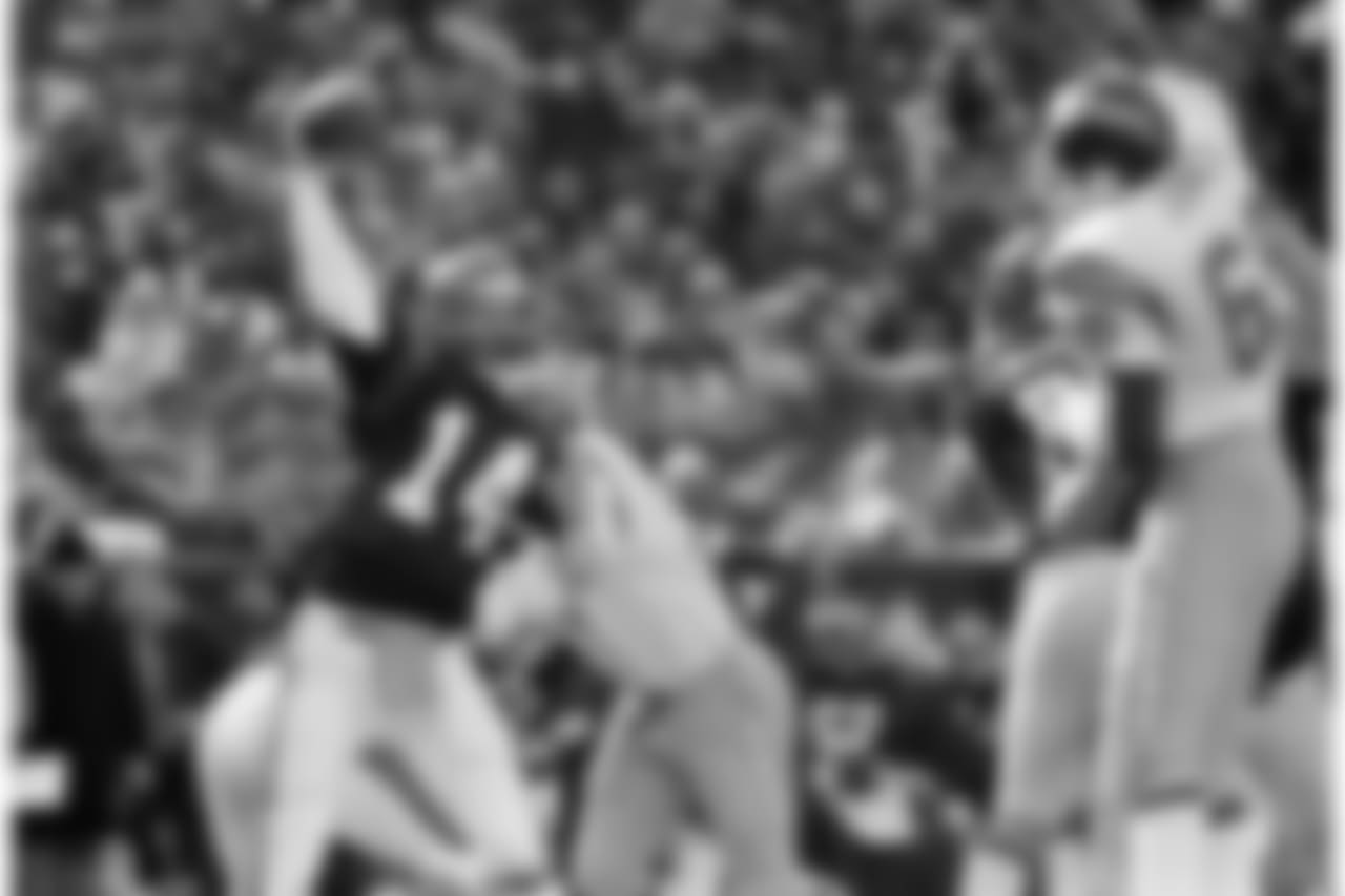 Cincinnati Bengals quarterback Ken Anderson, left, prepares to throw during the AFC championship game against the San Diego Chargers in Cincinnati on Jan. 10, 1982. (AP Photo)