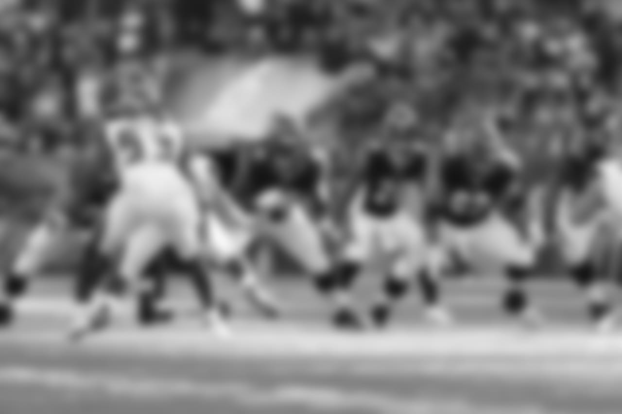 Trey Hopkins and Christian Westerman jump out into pass protection against the Tampa Bay Buccaneers.