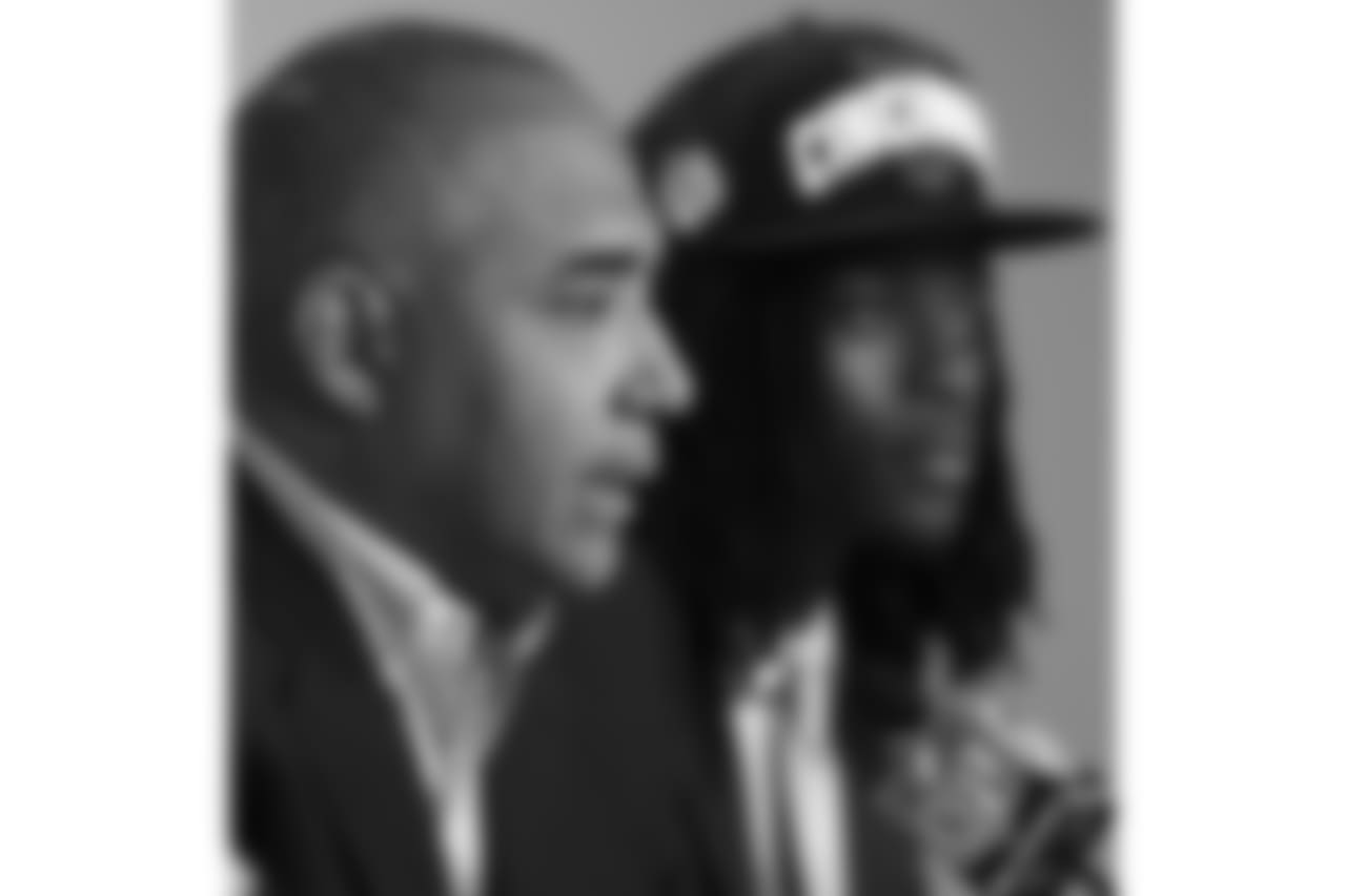 Cincinnati Bengals head coach Marvin Lewis, left, responds to a question as first-round NFL football draft pick Dre Kirkpatrick listens during a news conference, Friday, April 27, 2012, in Cincinnati. (AP Photo/Tony Tribble)