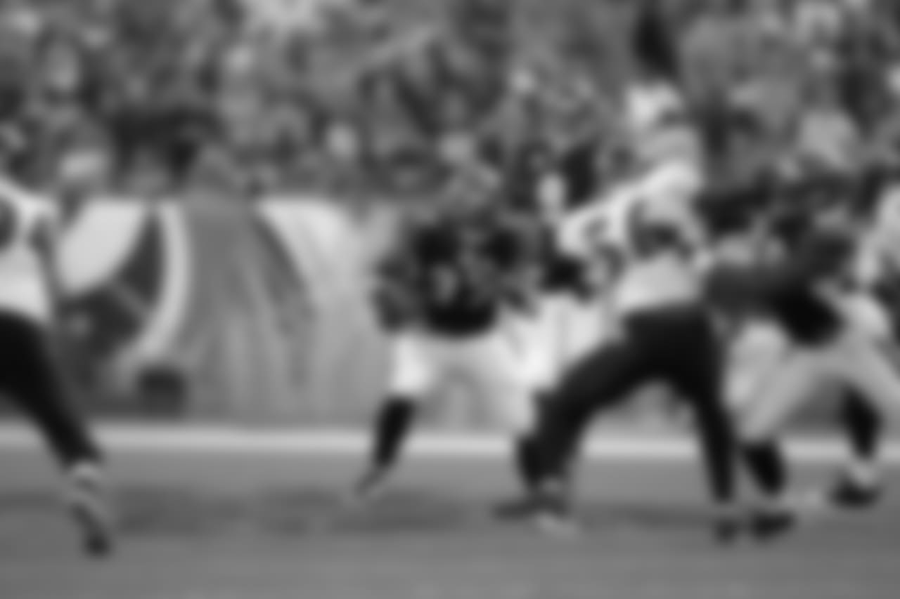 Cedric Benson finds a hole to rush through in a 2009 game against Baltimore.