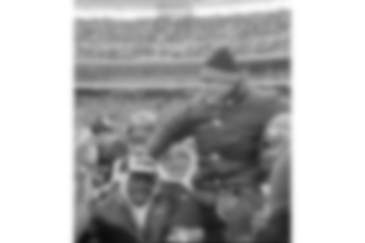 Cincinnati Bengals coach Forrest Gregg is carried off the field by jubilant players and fans after the Bengals defeated the San Diego Chargers in the AFC Championship playoff game in Cincinnati, Ohio, Jan. 10, 1982. The win gives the Bengals their first Super Bowl position. (AP Photo)