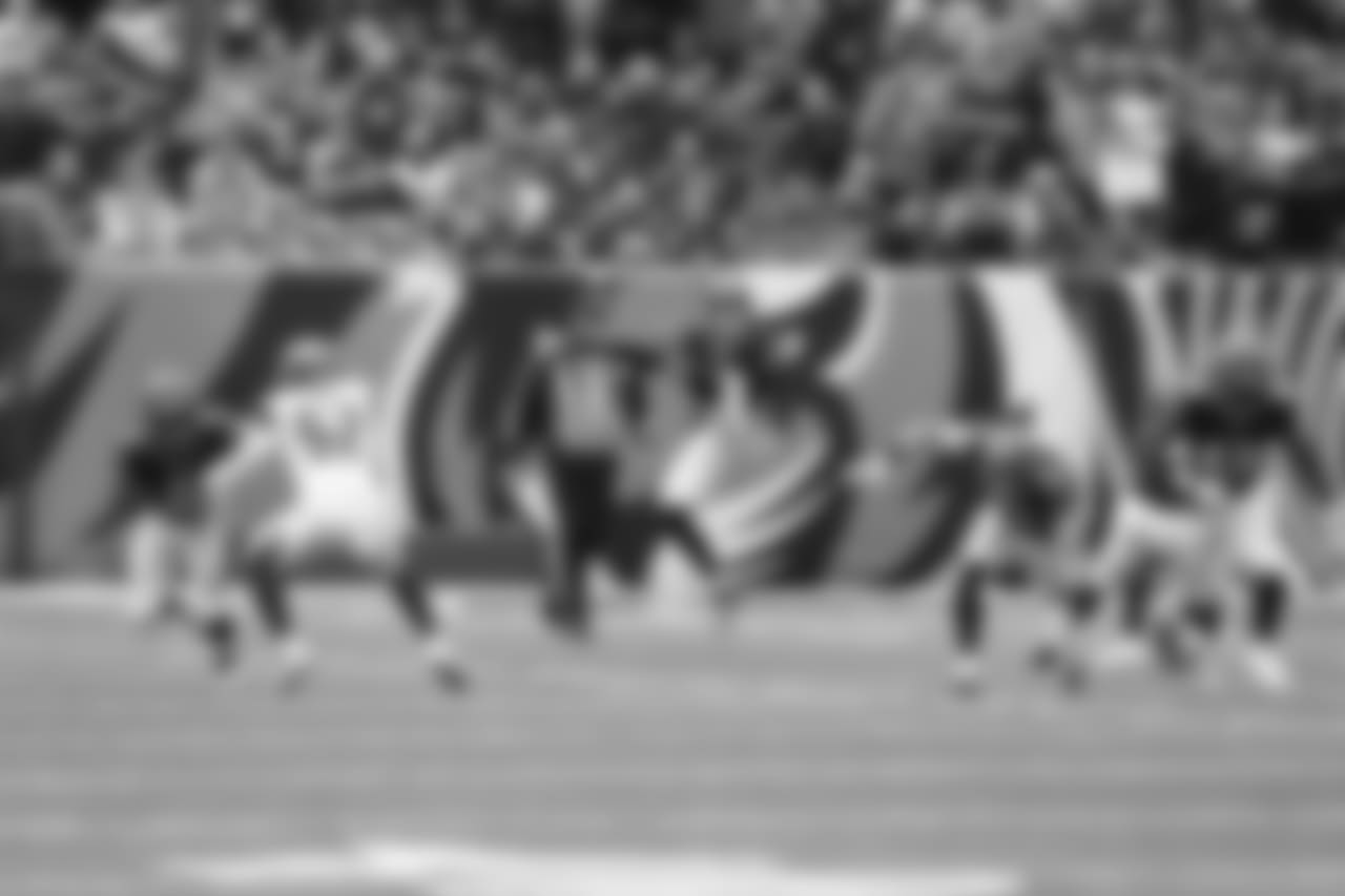 Punter Kevin Huber skies a kick during the second half against the Tampa Bay Buccaneers.