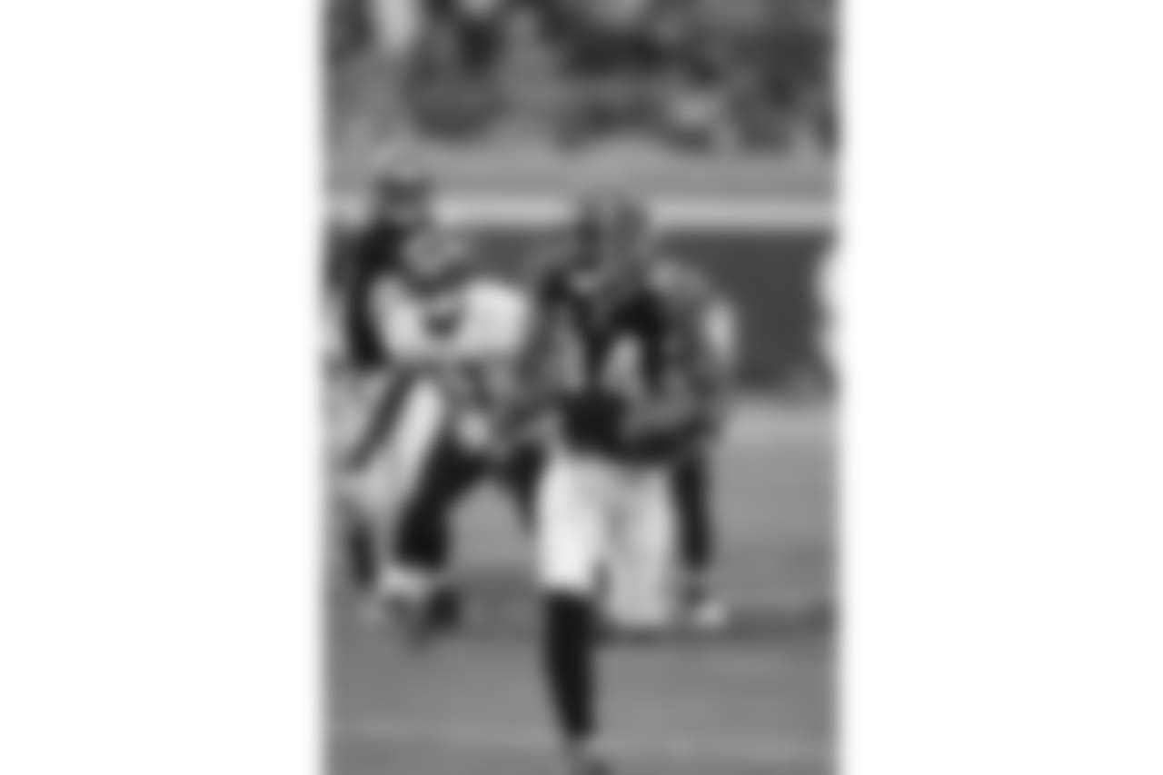 T.J. Houshmandzadeh runs down field against Baltimore in 2008.