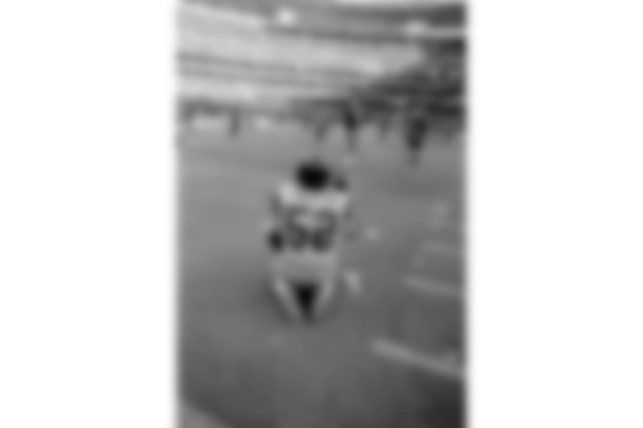 San Diego Chargers linebacker Ray Preston kneels on the turf after the Cincinnati Bengals defeated the Chargers 27-7 in the AFC championship game in Cincinnati on Jan. 10, 1982. (AP Photo)