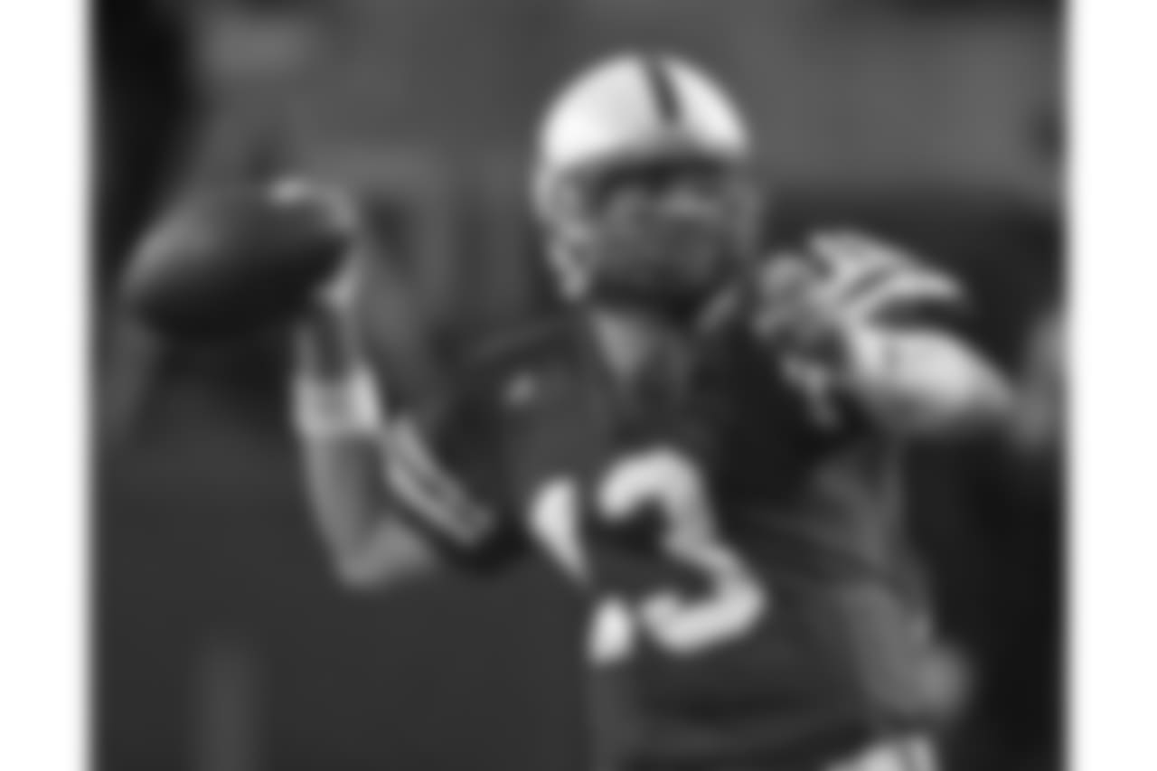 ** FILE ** Nebraska quarterback Zac Taylor throws against Colorado in their college football game in Lincoln, Neb., in this Nov. 24, 2006 file photo. Sooner born and Sooner bred, Zac Taylor ended up on the other side of one of college football's most storied rivalries. Now, he'll get a chance to play in a big Oklahoma-Nebraska game like the ones he grew up watching. (AP Photo/Dave Weaver)